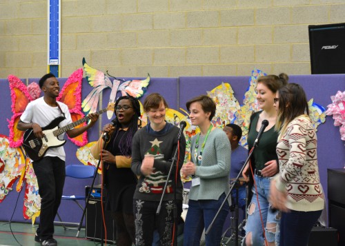 Students performing at the Advent assembly