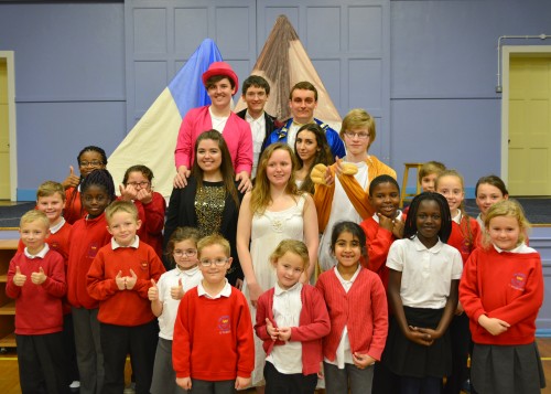 The cast with students at The School of Christ the King