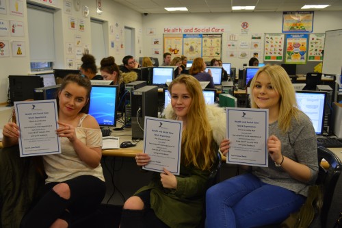 Students with their awards