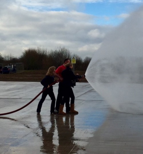 Public Services teachers try the hose! 