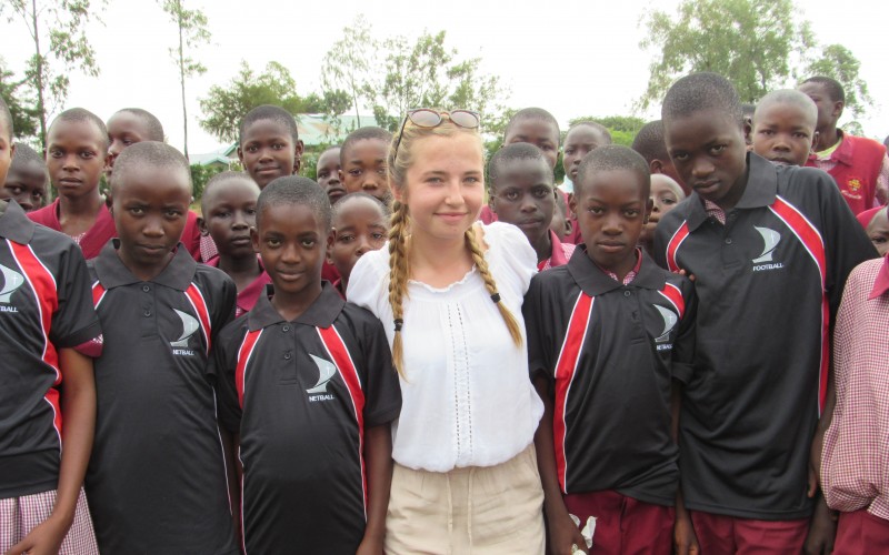 Megan Long with children in sports kits